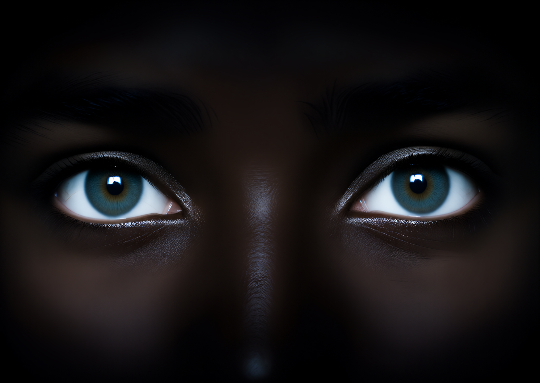 Close crop of teal eyes catching a sharp highlight against black skin.